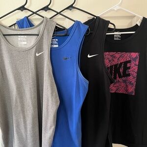 4 Nike Tank Tops 4.  - Gray, Blue, Black  and Black